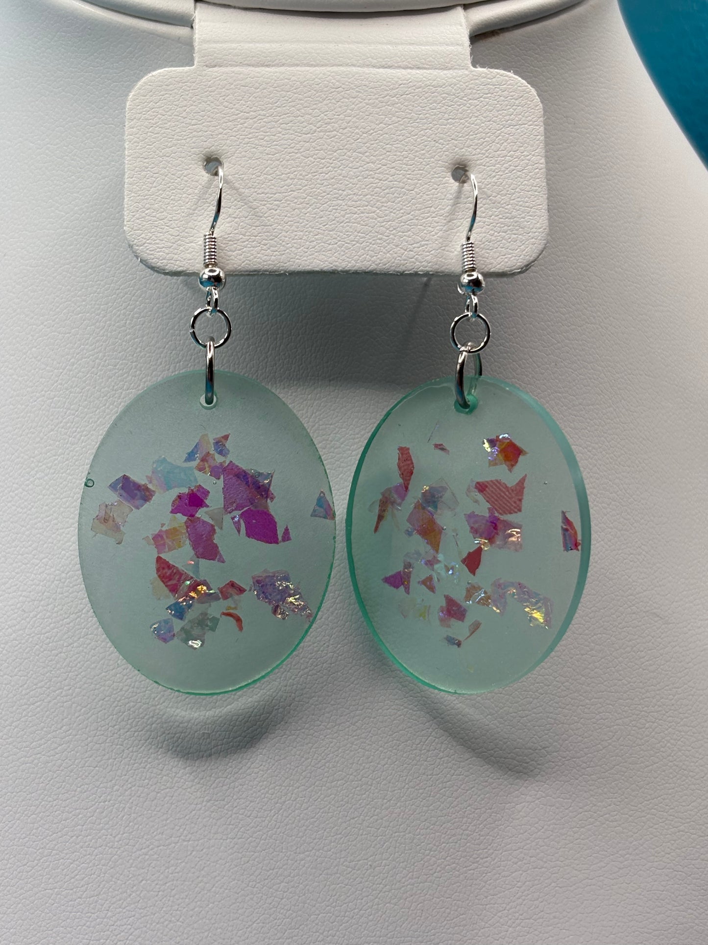 Green dangle earrings
